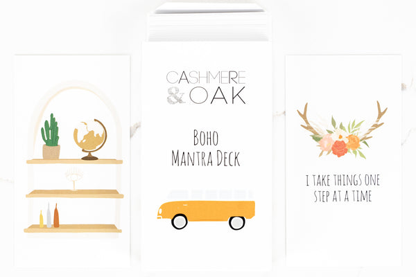 Boho Style Mantra or Intention Deck, front of card features antlers with flowers. Front of Deck Box features  old orange vw bus and the back of each card features a globe and a cactus plant on a set of boho vibe shelves shelf